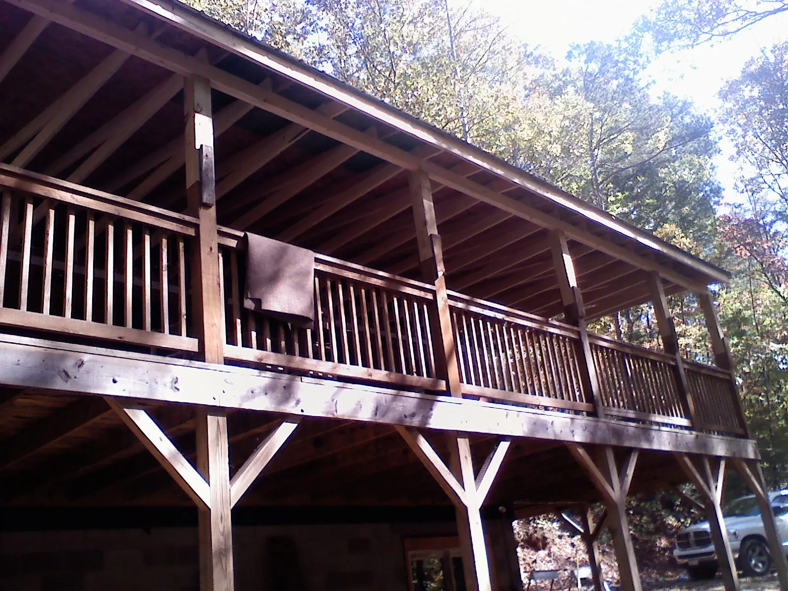 Timber framing under a new elevated porch and deck — Roof Leak Repair in Pontotoc by Roofing Brothers